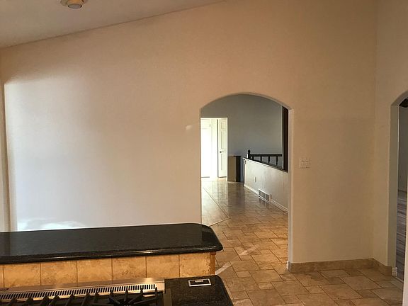 From the kitchen. Dining room to the right. Straight goes into living room.