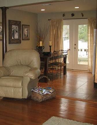 dining area, french doors open to deck and huge, fenced in backyard