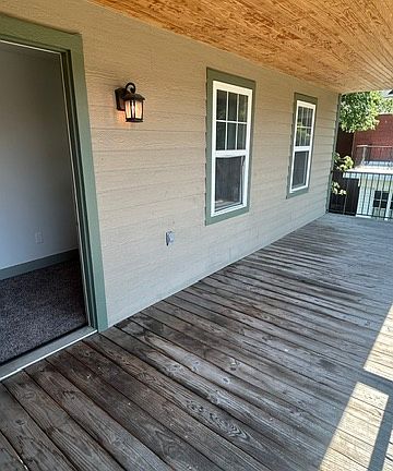 Private covered balcony off the primary bedroom