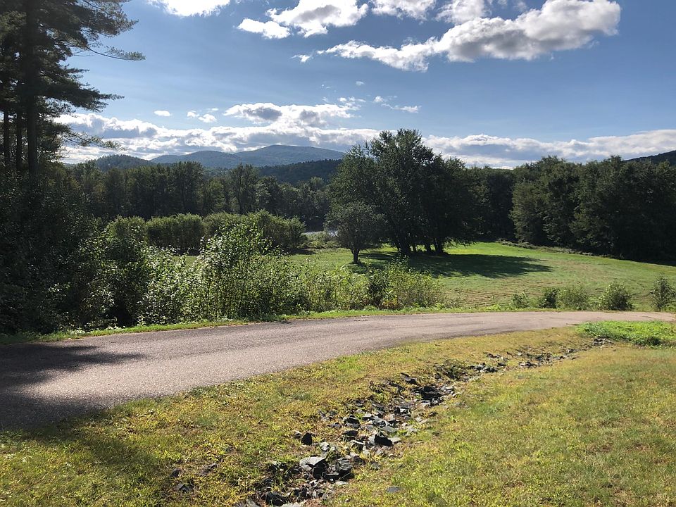road to association private beach on Pemi River, view of Plymouth Mountain