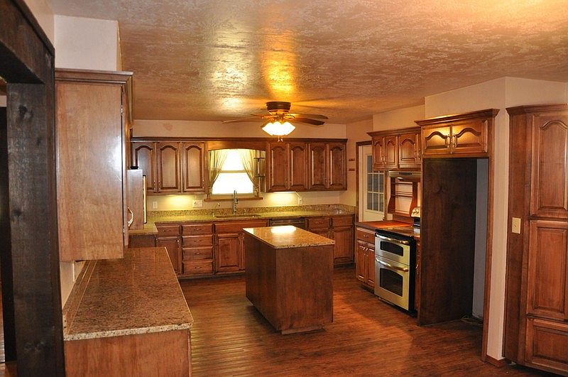 Kitchen
						:
						A chef's dream kitchen -- great layout with custom work throughout.