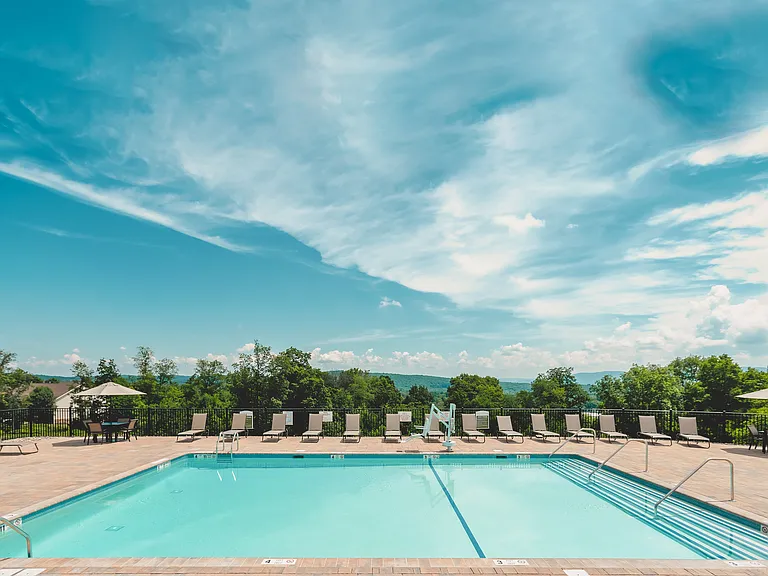 Experience relaxation by the heated outdoor pool, perfect for basking in the sun or enjoying a refreshing swim.