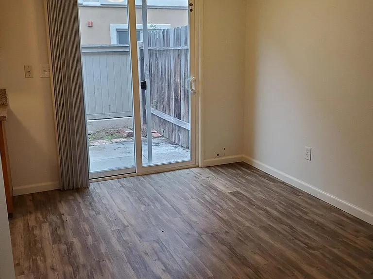 Dining Area 102" x 107" , Ceiling Fan and Slider to patio