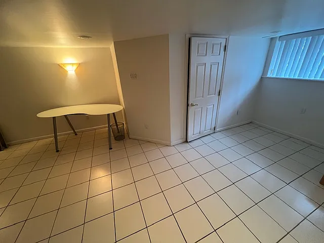 Finished basement, door to full bath