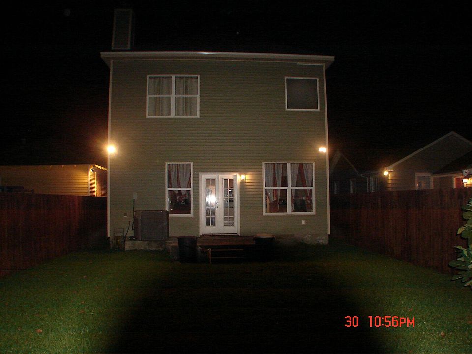 Looking at the house from the backyard
