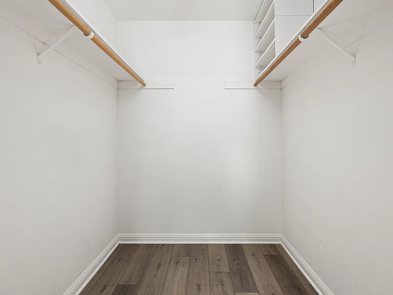 Primary Walk-in Closet has plenty of convenient space.