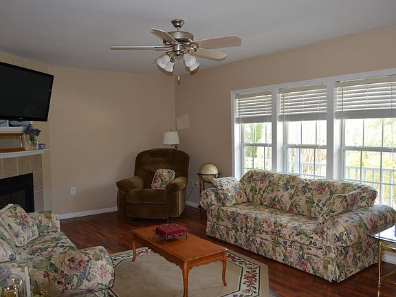 Living Room : Notice the fireplace, large window, and plenty of space for your furniture!
