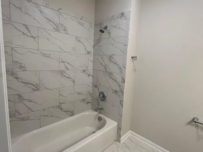 Tower RIdge Grande Secondary Bathroom -Luxury Tiled Bath/Shower Combonation in our Two Bedroom and One Bedroom Unit