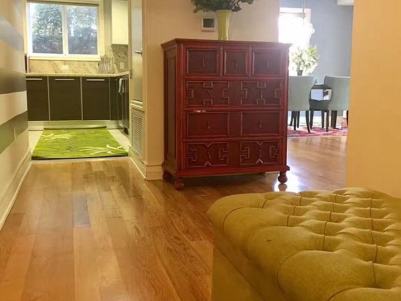 Walk-in area with a nice shoes cabinet stool