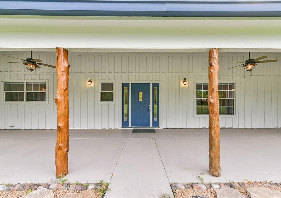 Bring your rockers and enjoy a mint julep while you relax in the cool breeze on this spacious front porch.