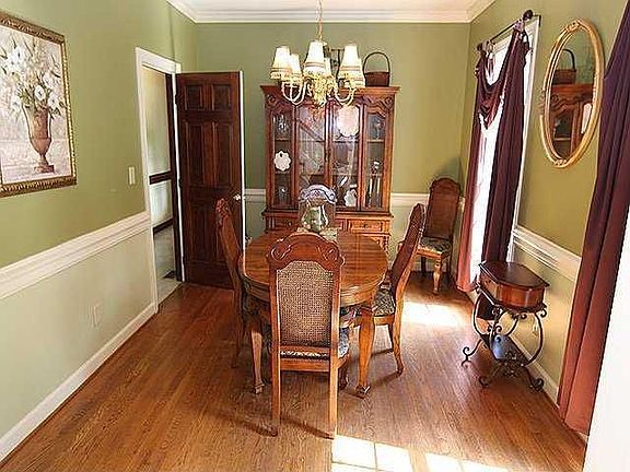 Light Bright Dining Rm with Lovely Hardwoods