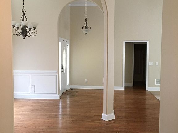View of front door from kitchen area 