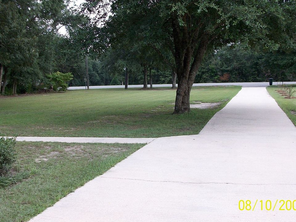 Long concrete driveway.