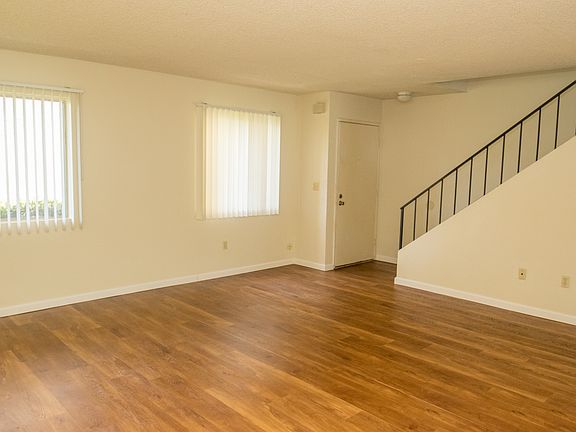 Living room and front entrance.