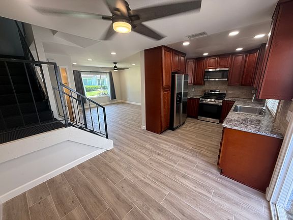 Kitchen and living room viewed from dining room