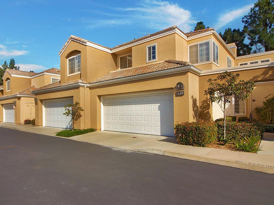 Townhome with two attached garage that are larger than standard garages