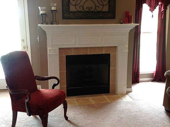 Gas log fireplace in living room