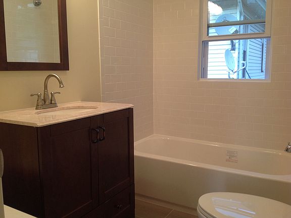 New bathroom in both apts