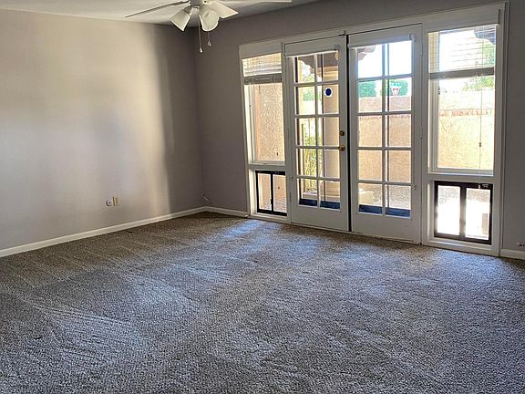Primary bedroom off dining room and entry to kitchen.