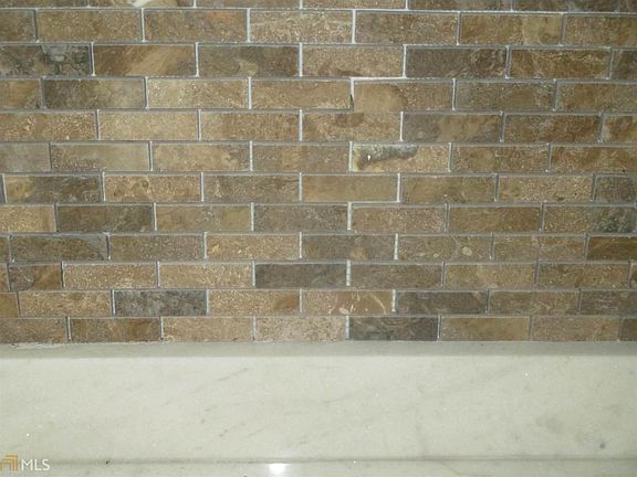 Custom Stone Back Splash and Marble Countertop