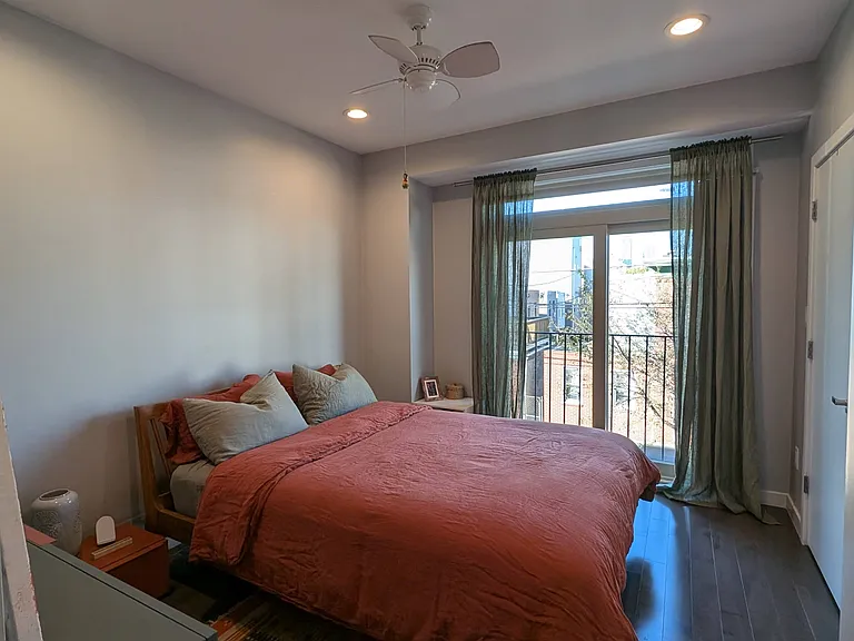 Main bedroom with a window to Federal St