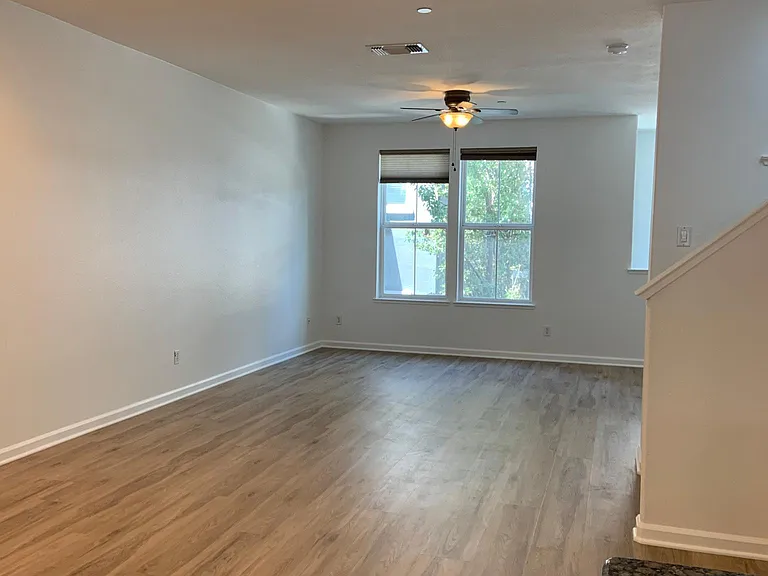 Bright and airy living room and dining area.