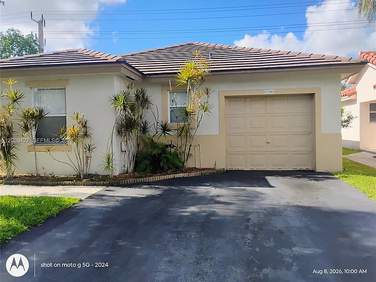 6766 NW 69th Ct — Photo 1