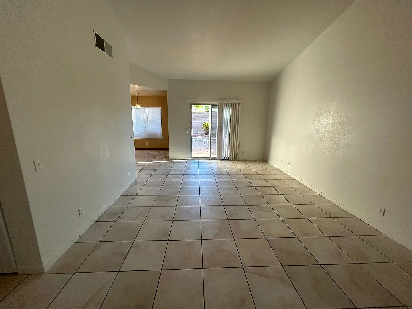 Single story with tile in most living areas. Huge backyard. — Photo 3