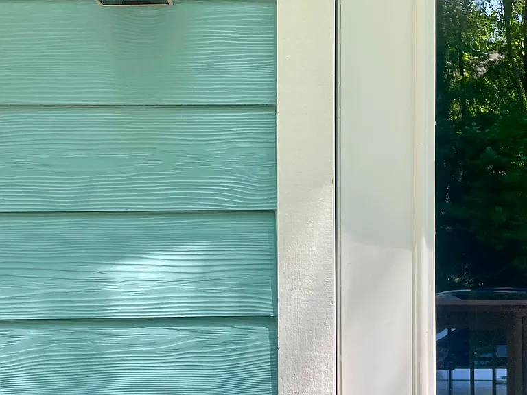 Front door with keyless entry and plenty of light. Flood lights are not seen but on the corner of the house.