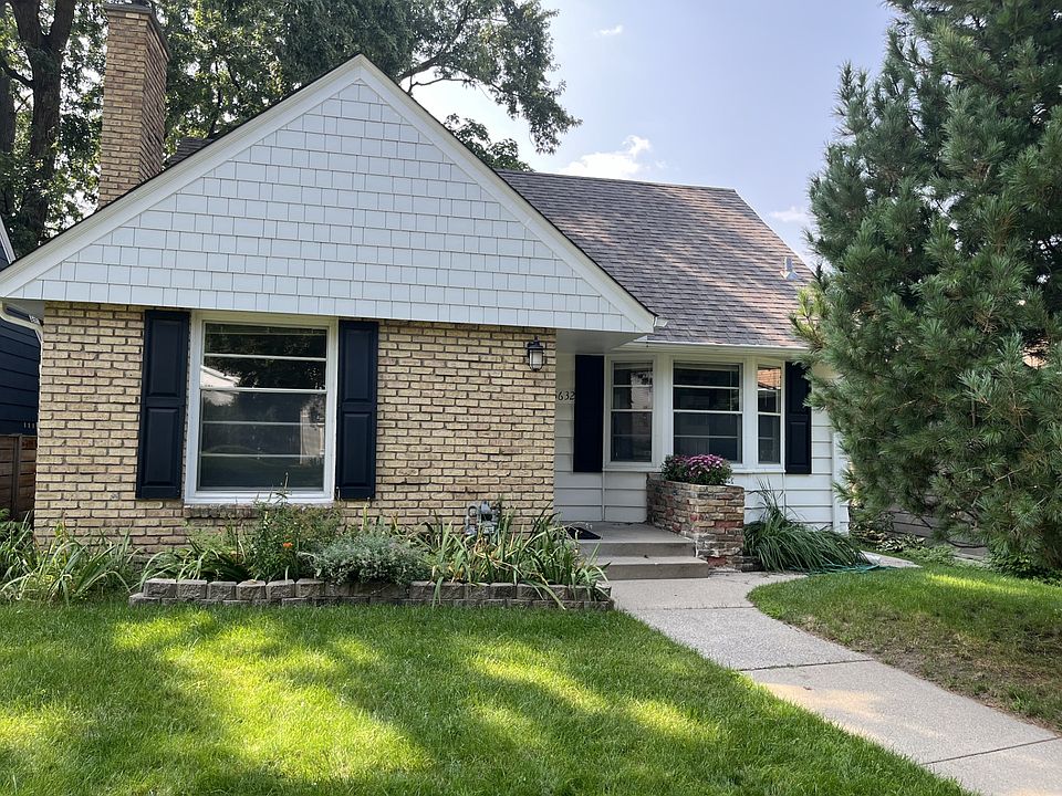 Charming front with newly sided gable.