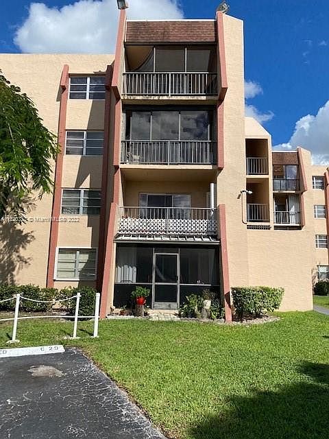 Outside of building, second floor unit