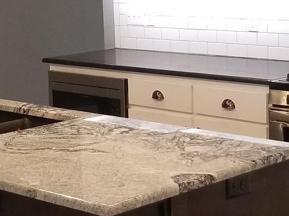 Granite countertops through out kitchen and bathrooms