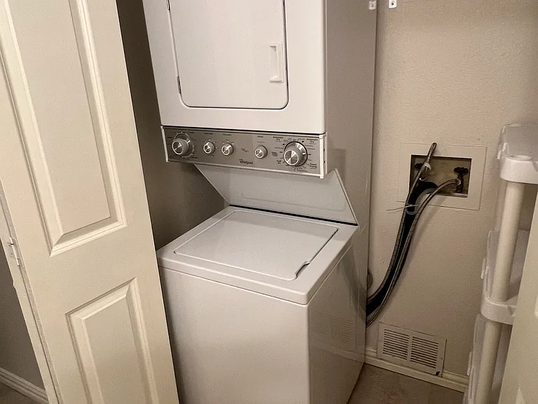 Laundry closet with washer and dryer included
