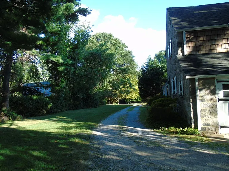 View down driveway to street
