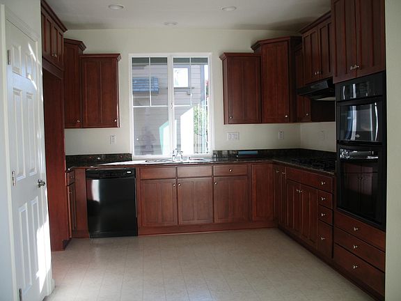 kitchen, cabinets, appliances and pantry