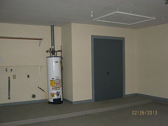 Garage showing storage closet