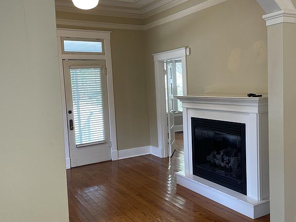 Living room fireplace as seen from dining room