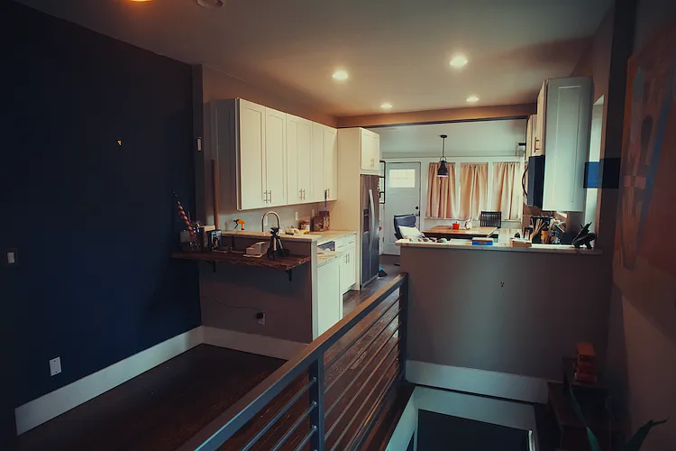kitchen with stairway to basement