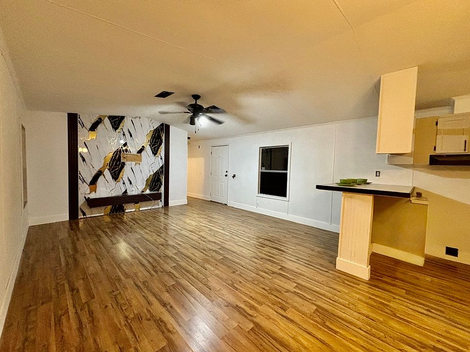 Living room with decorative accent wall for TV