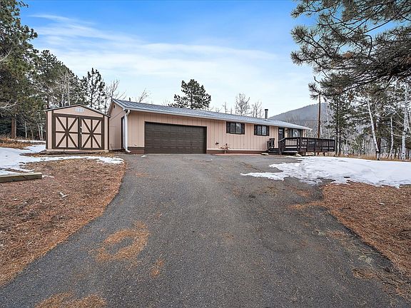 Paved Driveway and Two Car Attached Garage