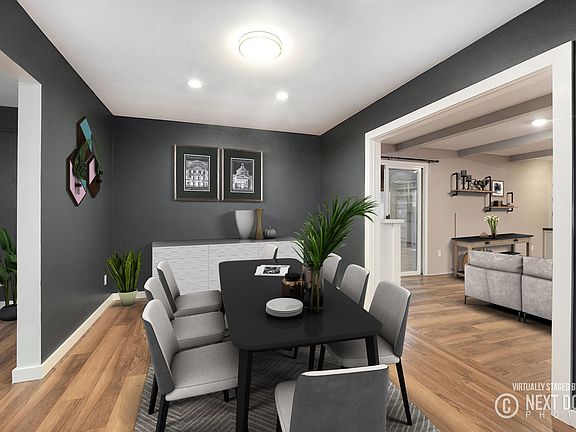 The dining room is convenient to the family room, kitchen, and living room.