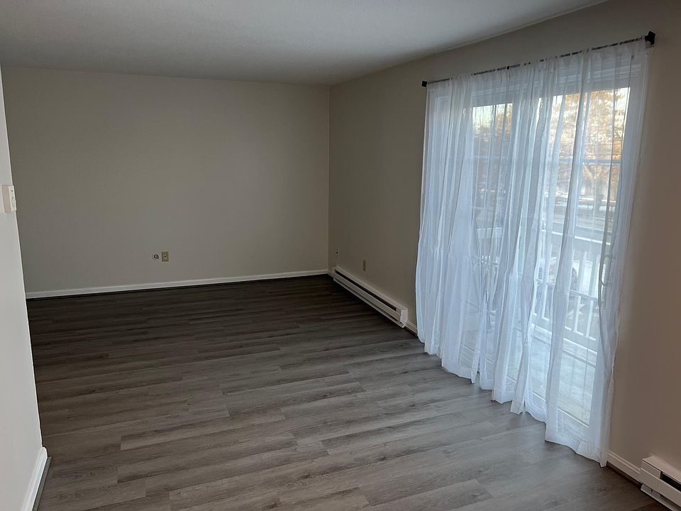 Large Living Room with Balcony, New LVT Throughout