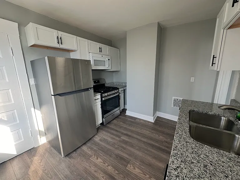 7705 Sagamore Ave #UP — Photo 3