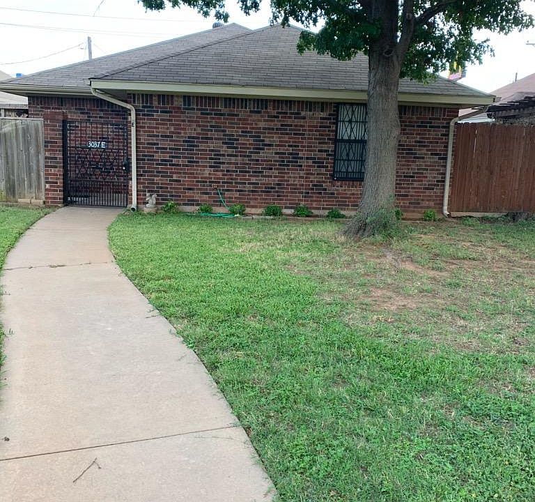 Zero lot line home with nicely landscaped patio