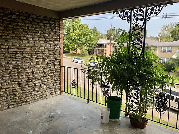 Adorable balcony overlooking the cul de sac.