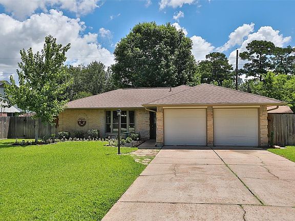Canned lights over the garage & electric light in front yard. Garage door openers replaced 2019.