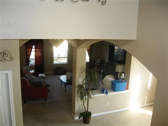 View from Stairs into First Floor Family Room.