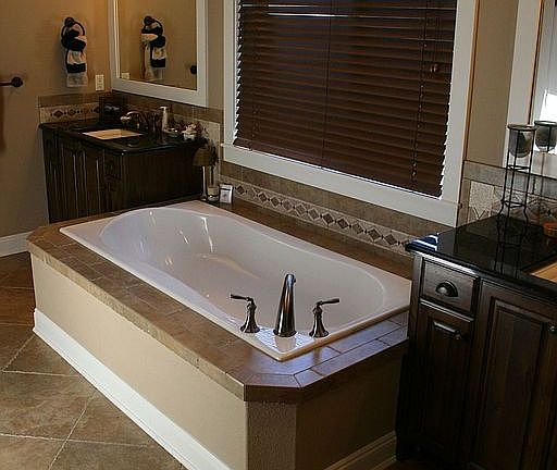 Hand chiseled travertine throughout Master Bath