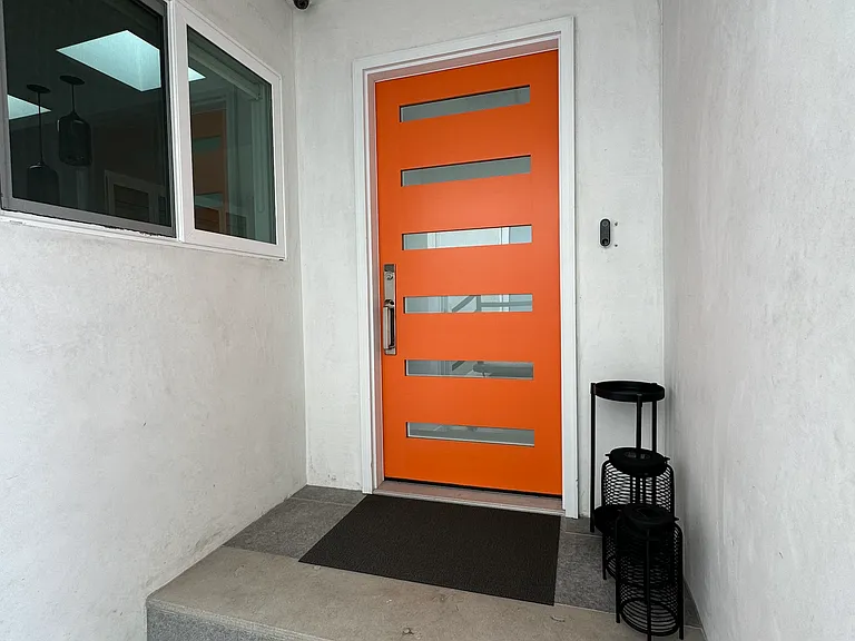 Covered entry, ring cam doorbell and perimeter cameras on house.