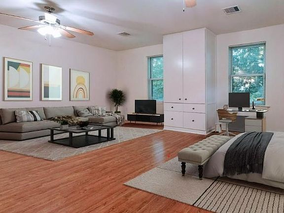 View looking towards windows flooding space with plenty of natural light.